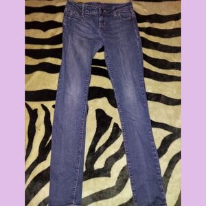 Straight Leg Blue Jeans With Purple Hue